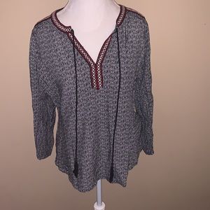 Daniel Rainn long Sleeve black and white boho top with tassels and red trim